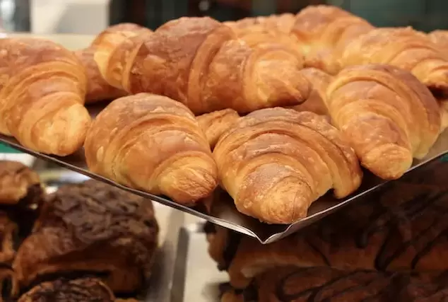 Artisan butter croissants on a tray